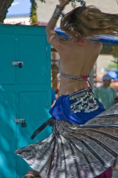 A belly dancer on a summer afternoon in New Mexico.