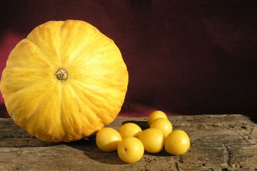 many yellow fruits  - some plums and melon