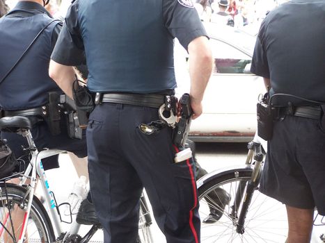 these three policemen are ready for action