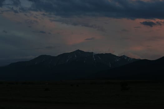 Colorado Mountains at sunrise, midday and sunset