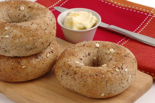 Healthy multigrain bagels served with fresh butter.