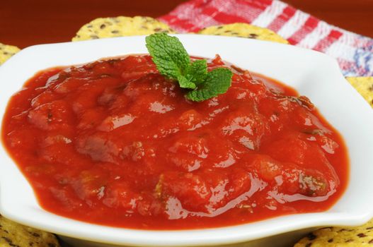 Fresh made salsa in a white bowl.