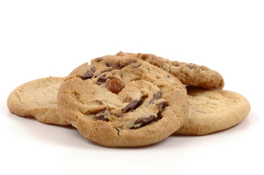 Assorted fresh baked cookies on a white background.