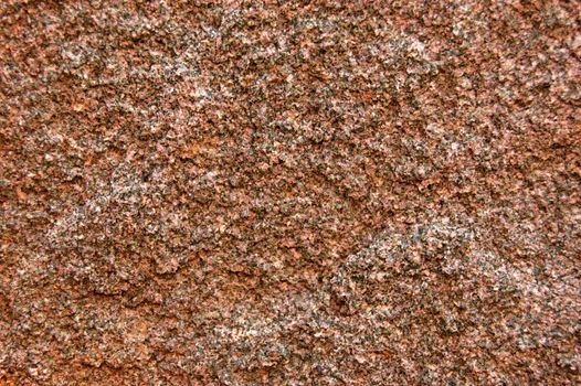 colored rough surface of wild stone .