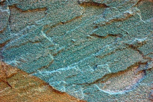 colored (prevaling blue) rough stone surface