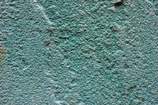 colored (prevaling blue) rough stone surface