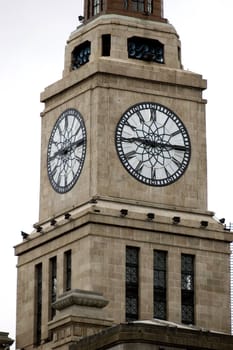 Classic style clock tower in Shanghai, near Zhongshan Road.