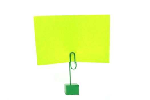 A card holder with a florescent green paper.