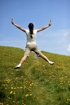 Woman enjoying her summer holidays at the mountains