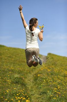 Woman enjoying her summer holidays at the mountains