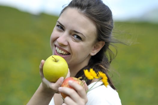 Woman enjoying her summer holidays at the mountains