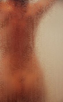 Female model having a shower