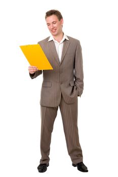Young businessman with yellow folder on a white background.