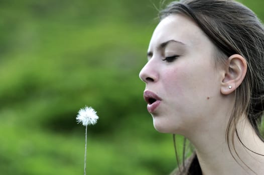 Woman playing with the pollen