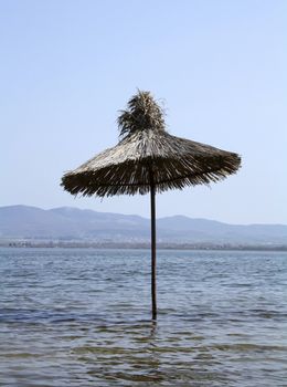 Umbrella in the water in Dojran Lake, Macedonia