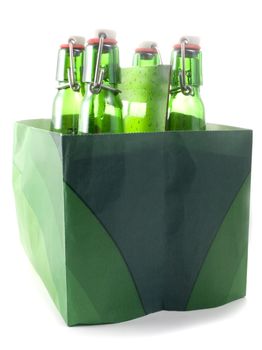 Box with green Beer bottles isolated on white