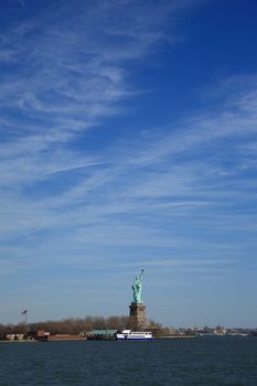 Statue of Liberty under a big sky