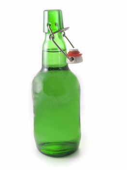 Close-up of Beer bottle isolated on white background