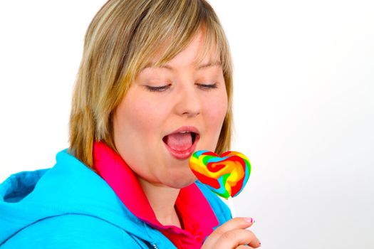 Young woman with Lollipop on white background. Shot in studio.