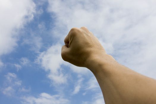 Hand with the Sky Background
to show challenge to a fight or contest.