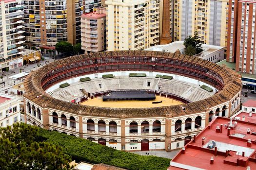 Bullring between buildings in Malaga, Spain, Andalusia