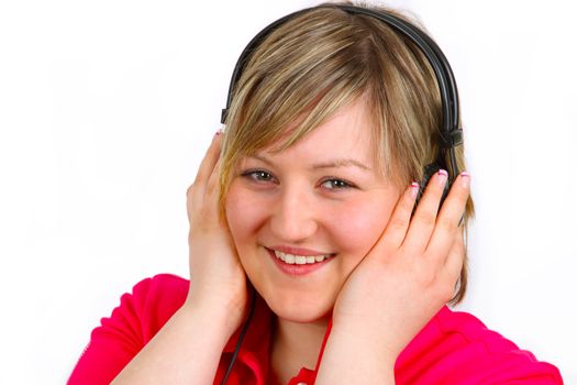 Young woman with headset on white background. Shot in studio.