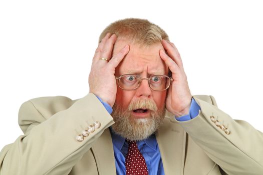 Close up portrait of distressed businessman with hands on his face, white background.
