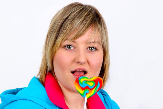 Young woman with Lollipop on white background. Shot in studio.