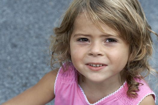 a picture of a cute little girl smiling