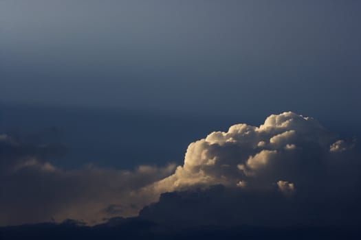 Sun peeking through clouds.