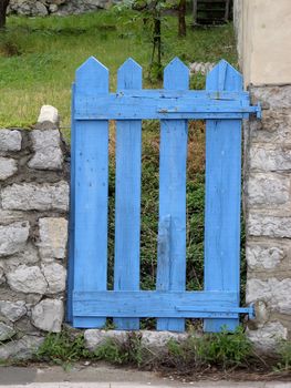 blue gate of a gardenin a provence back-country village