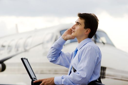 Businessman buy tickets on plane through internet