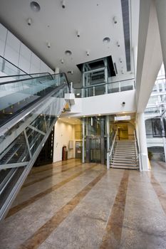 lift,stair and escalator all in one room.