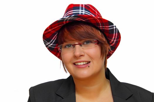 Portrait of an attractive young woman wearing a checkered hat.
