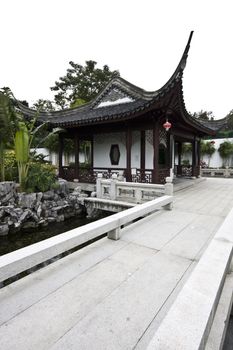 A typical Chinese garden with a pond.