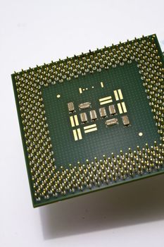 It is silicone chip CPU  on white background.