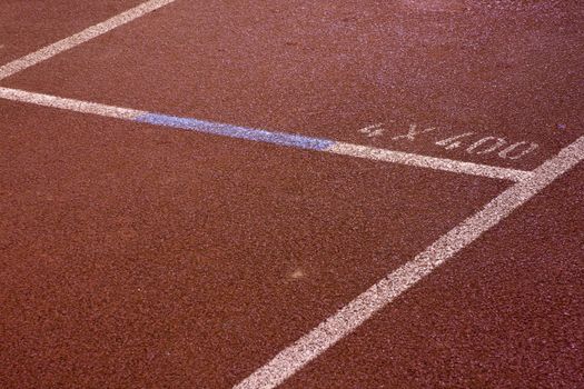 Running lanes on a track in play gorund 