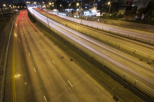 It is a shot of hong kong traffic night