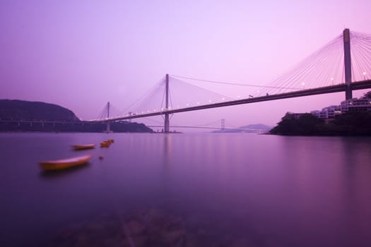 It is beautiful night scenes of Bridge in Hong Kong.