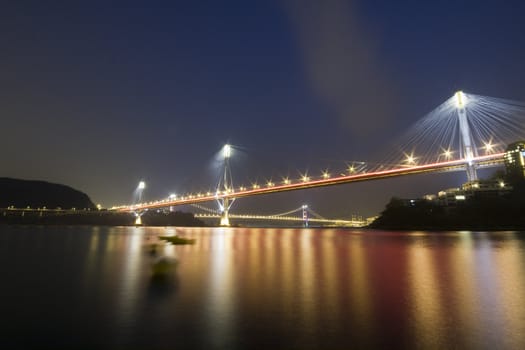 It is beautiful night scenes of Bridge in Hong Kong.