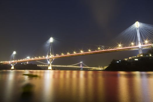 It is beautiful night scenes of Bridge in Hong Kong.