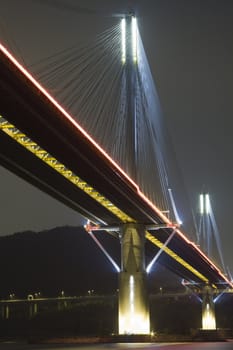 It is beautiful night scenes of Bridge in Hong Kong.