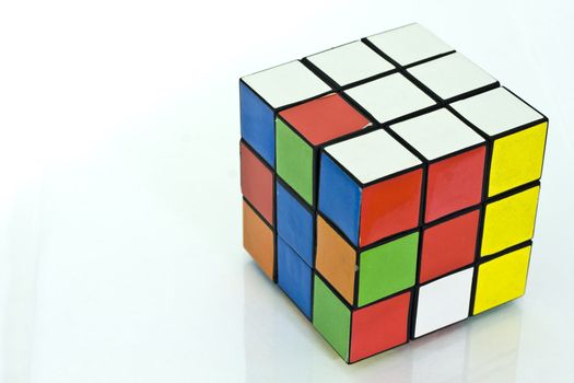 It is a Rubik's cube over white background