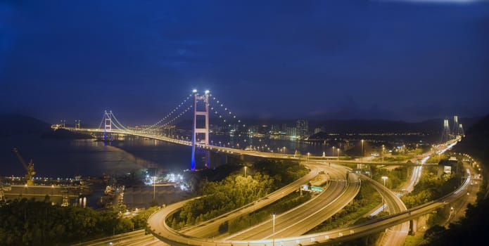 A magical evening of Hong Kong Tsing Ma Bridge .       