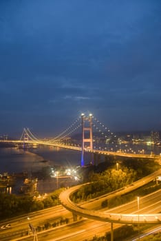 A magical evening of Hong Kong Tsing Ma Bridge . 