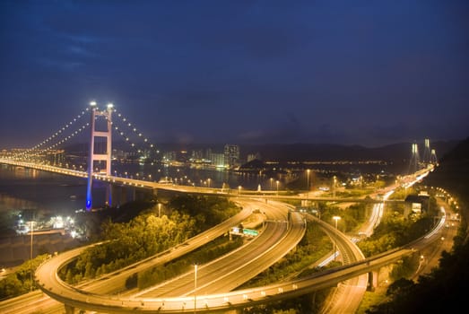 A magical evening of Hong Kong Tsing Ma Bridge .       