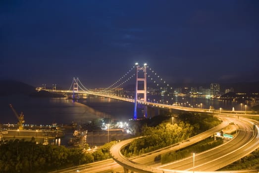 A magical evening of Hong Kong Tsing Ma Bridge .       