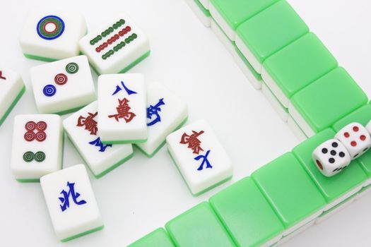 Chinese game similar to poker. Very popular gambling game.