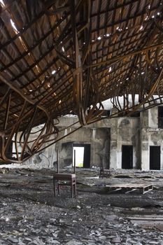 Discarded building, metal roof fall down