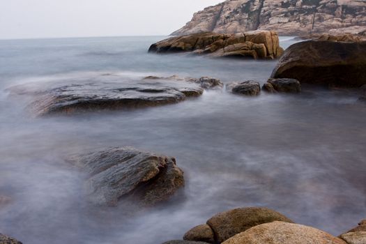 Long exposure of rock coast background